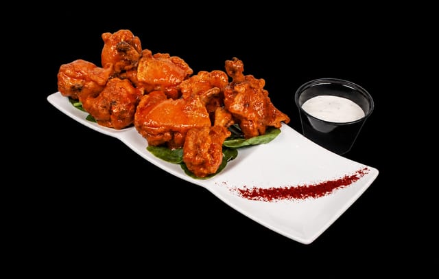 Buffalo Chicken Lollipops.